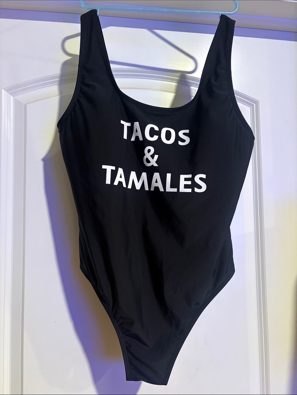 Women’s Black One-Piece Swimsuit with "TACOS & TAMALES"